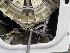 Removing front bolts on a Beko WME7267W washing machine motor