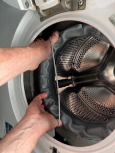 replacing the spring that holds the door seal on a beko washing machine